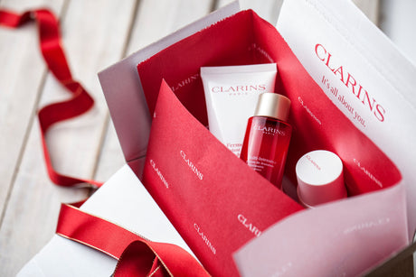 open lil packaging breezebox made for clarins cosmetics, showing clarins brand