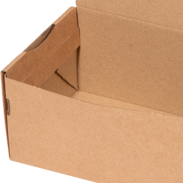 Close-up of a brown cardboard box corner on a white background