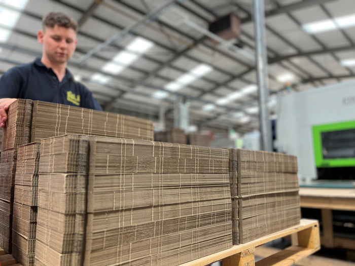 Photograph of person working at Lil Packaging