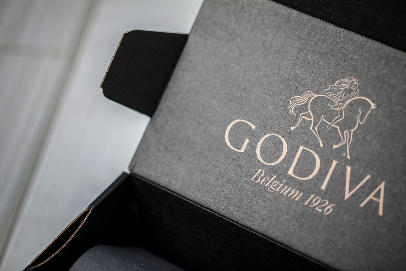 Chocolate Postal Packaging. Image showing a Godiva of Belgium chocolate box produced by Lil Packaging